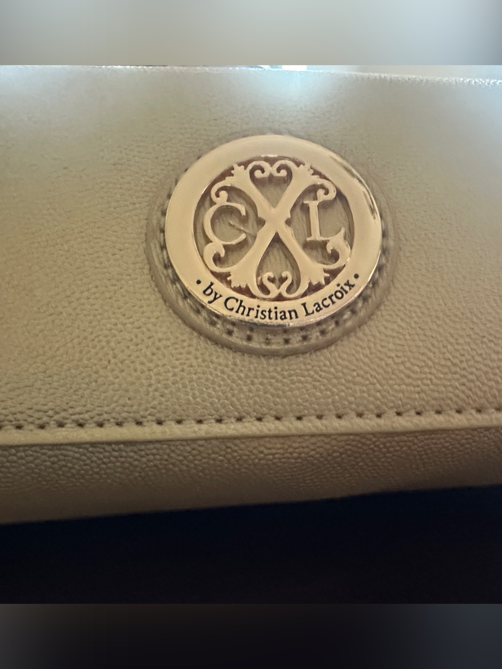 Christian Lacroix Cream Leather Wristlet Clutch with Silver Medallion